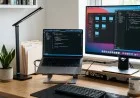 Well-organized developer desk with dual monitors, clean cables, and structured file explorer.